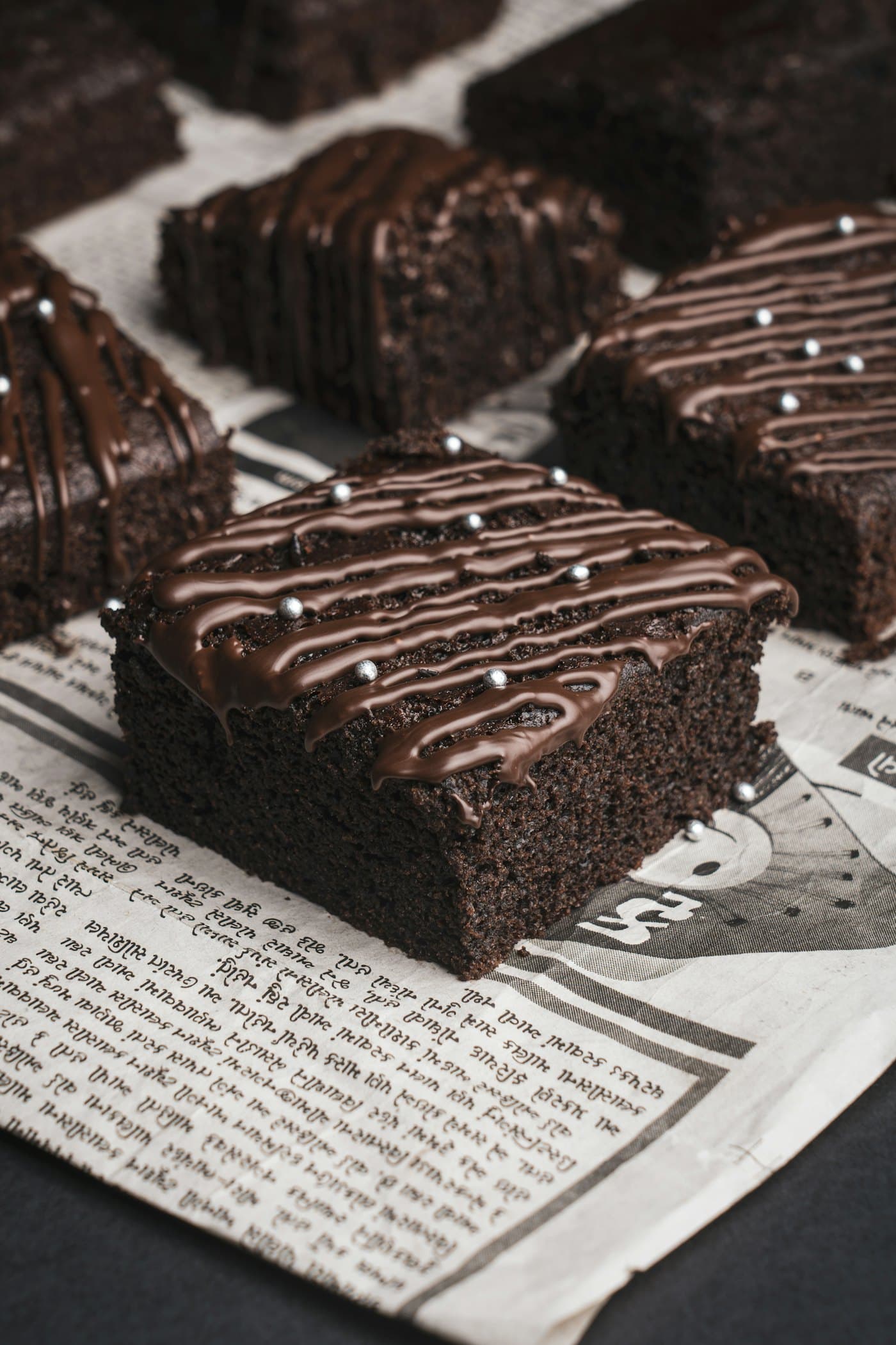 Brownies finished with a chocolate drizzle